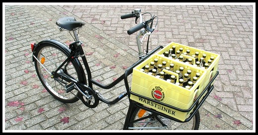http://lovingthebike.com/wp-content/uploads/2013/07/Bicycle-beer-basket.jpg